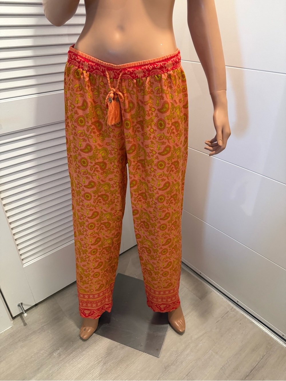 Paparazzi orange print pants large